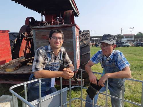 John Warkentin, 18, and his brother Jacob, 14, are two of the much-needed younger generation that have taken an interest in operating steam engines. The brothers volunteered to help run engines as part of the Austin Threshermen&rsquo;s Reunion & Stampede in July. (Connor McDowell/The Brandon Sun)