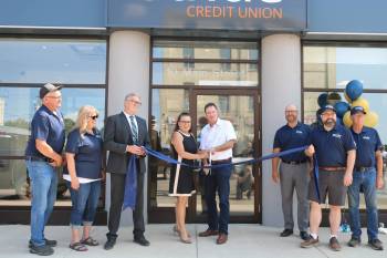 Stride Credit Union employees and CEO, along with area dignitaries, cut the ribbon to commemorate the new local business&rsquo;s grand opening. (Rylee Gerrard/The Brandon Sun)
                                Stride Credit Union employees and CEO, along with area dignitaries, cut the ribbon to commemorate the new local business&rsquo;s grand opening. (Rylee Gerrard/The Brandon Sun)
