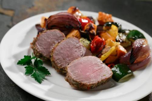 Oven-Roasted Pork Souvlaki with Vegetables: A little taste of Greece enhances this meal featuring pork tenderloin. (Photo courtesy Manitoba Pork)