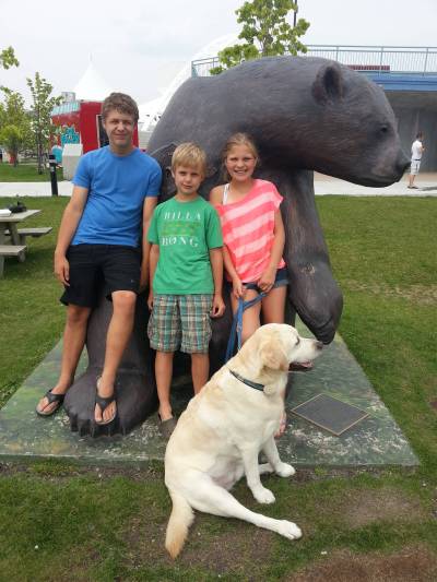 SUPPLIED
                                From left: Jonah, Sam and Grace Penner, and their dog Murphy, during their summer camping years.