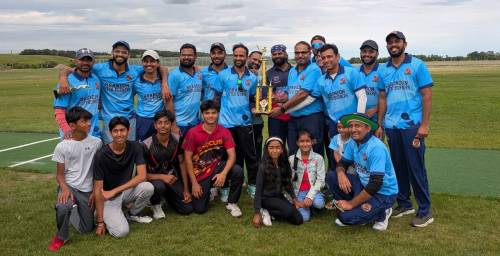 Kushang Patel (bottom right) and his team the Brandon Pitch burners standing around the trophuy after winning the championship match of the hard tennis ball division at Canadian Packer&rsquo;s Sports Complex on Aug. 9. (Submitted)